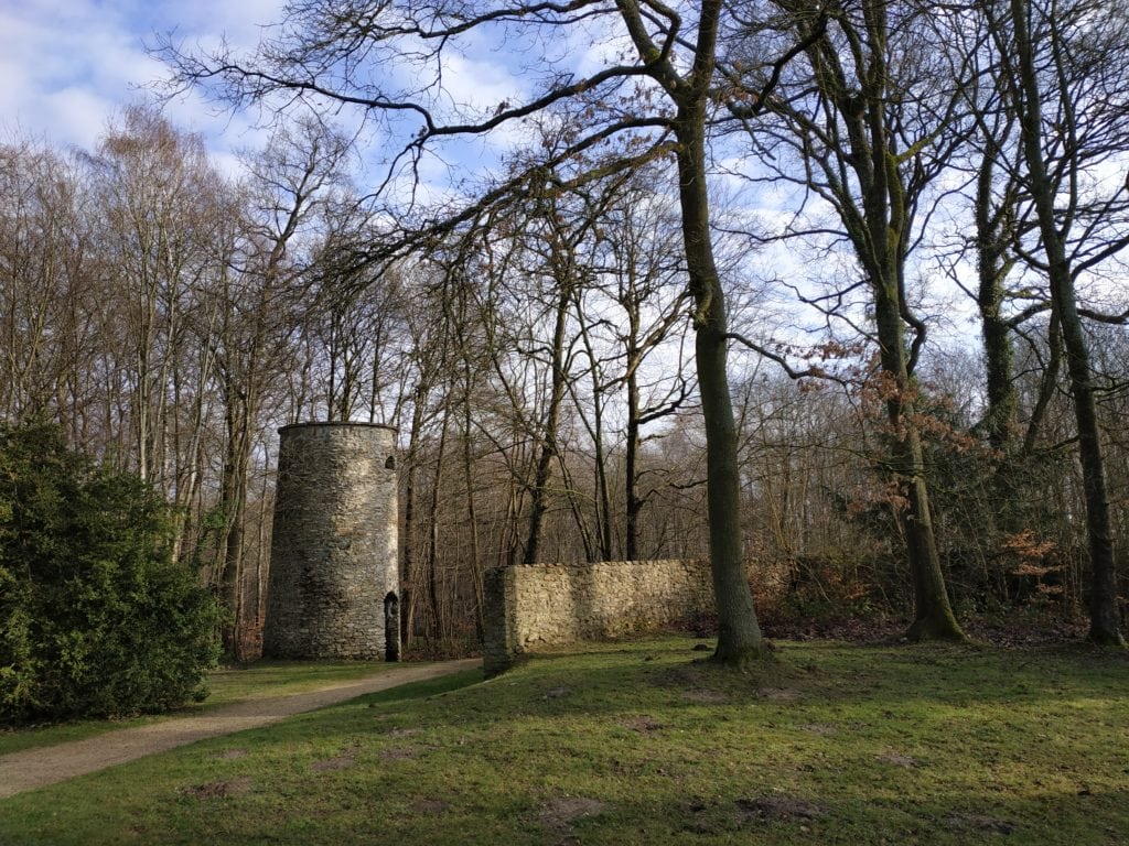 Stone tower during the walk on the mound of Montgé